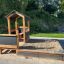 Drewniany domek do zabawy z piaskownicą dla dzieci